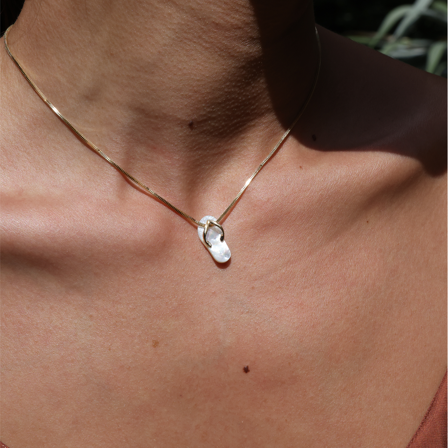White Mother of Pearl Slipper Pendant in Gold - 19mm